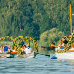 Blumengeschmückte Boote beim Hausherrenfest in Radolfzell auf dem Bodensee. Traditionelles Fest.